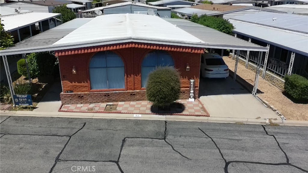 9800 Base Line Road, Unit 82 Alta Loma, CA 91701 - Photo 12 of 28 a house view with a outdoor space