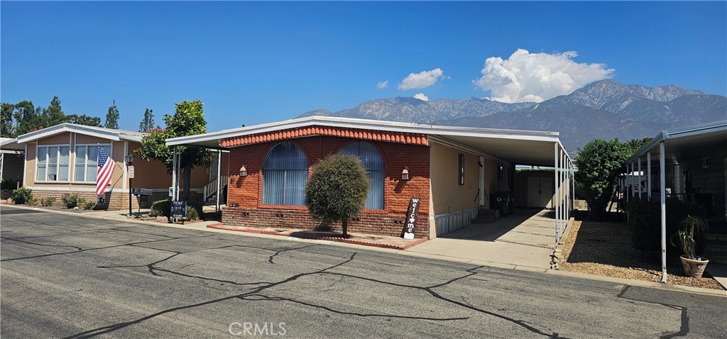 9800 Base Line Road, Unit 82 Alta Loma, CA 91701 - Photo 13 of 28 a view of a house with outdoor space