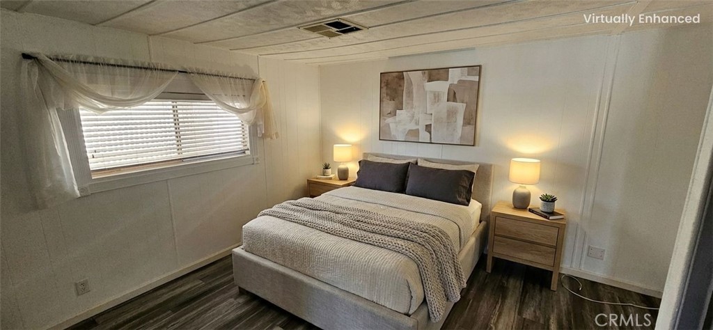 9800 Base Line Road, Unit 82 Alta Loma, CA 91701 - Photo 5 of 28 a bedroom with a bed and a window