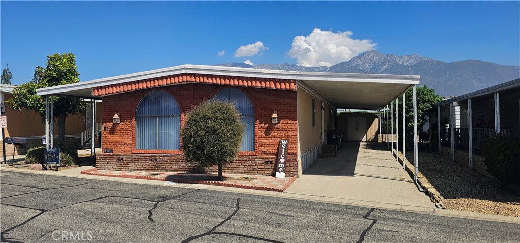 9800 Base Line Road, Unit 82 Alta Loma, CA 91701 - Photo 8 of 28 a front view of a house