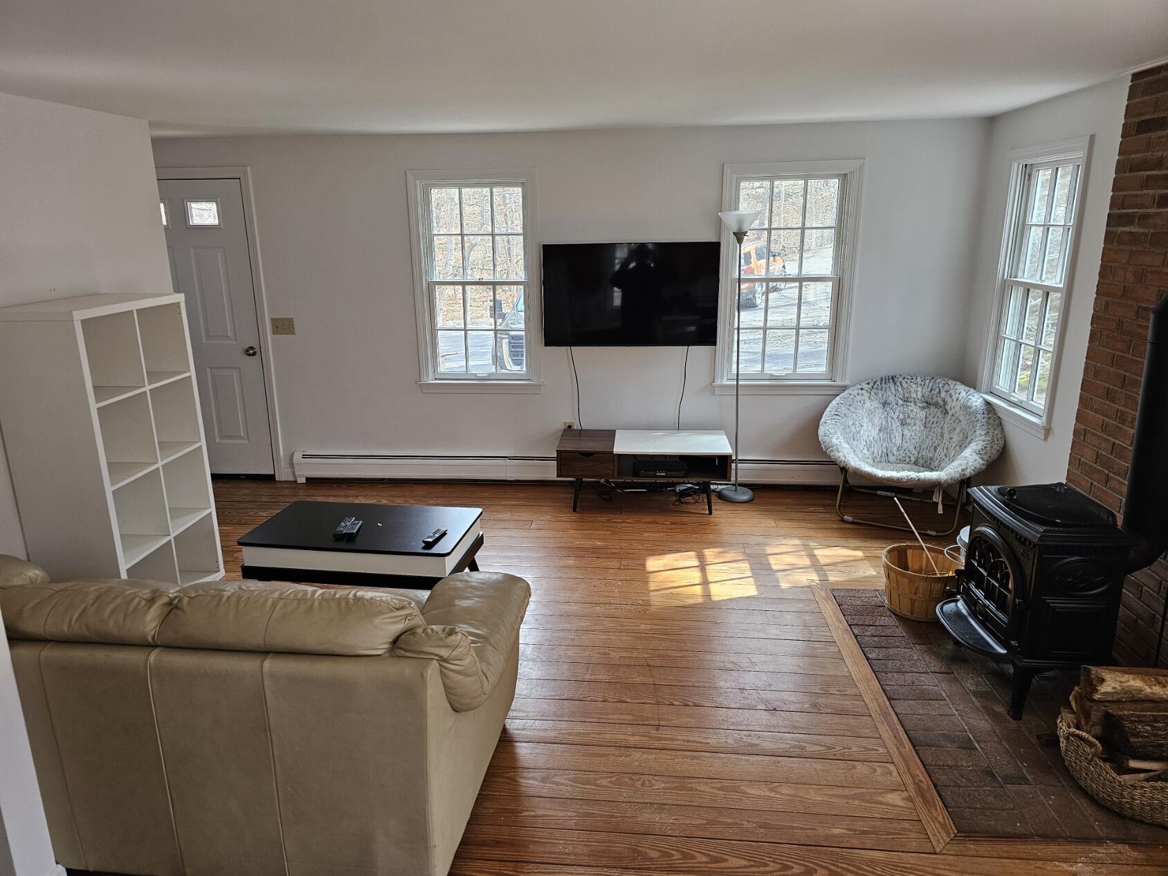 3098 State Highway Wellfleet, MA 02667 - Photo 8 of 13 a living room with furniture and a flat screen tv