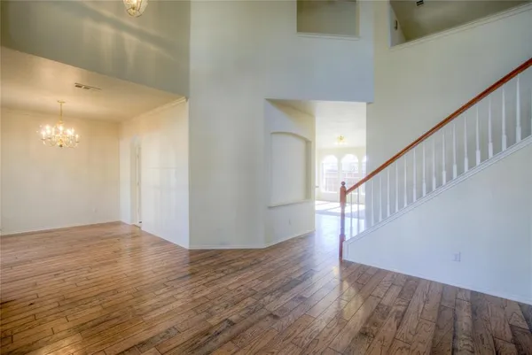 a view of entryway with wooden floor