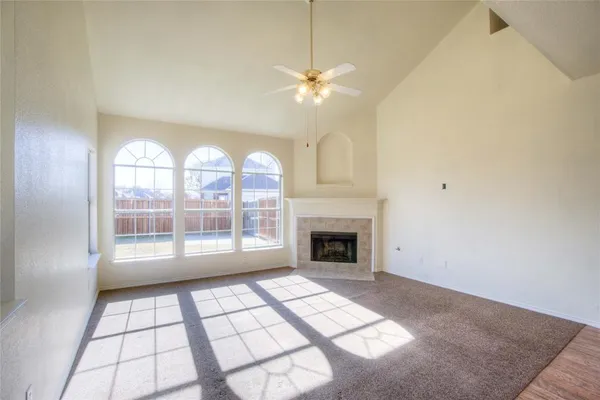 a view of empty room with windows
