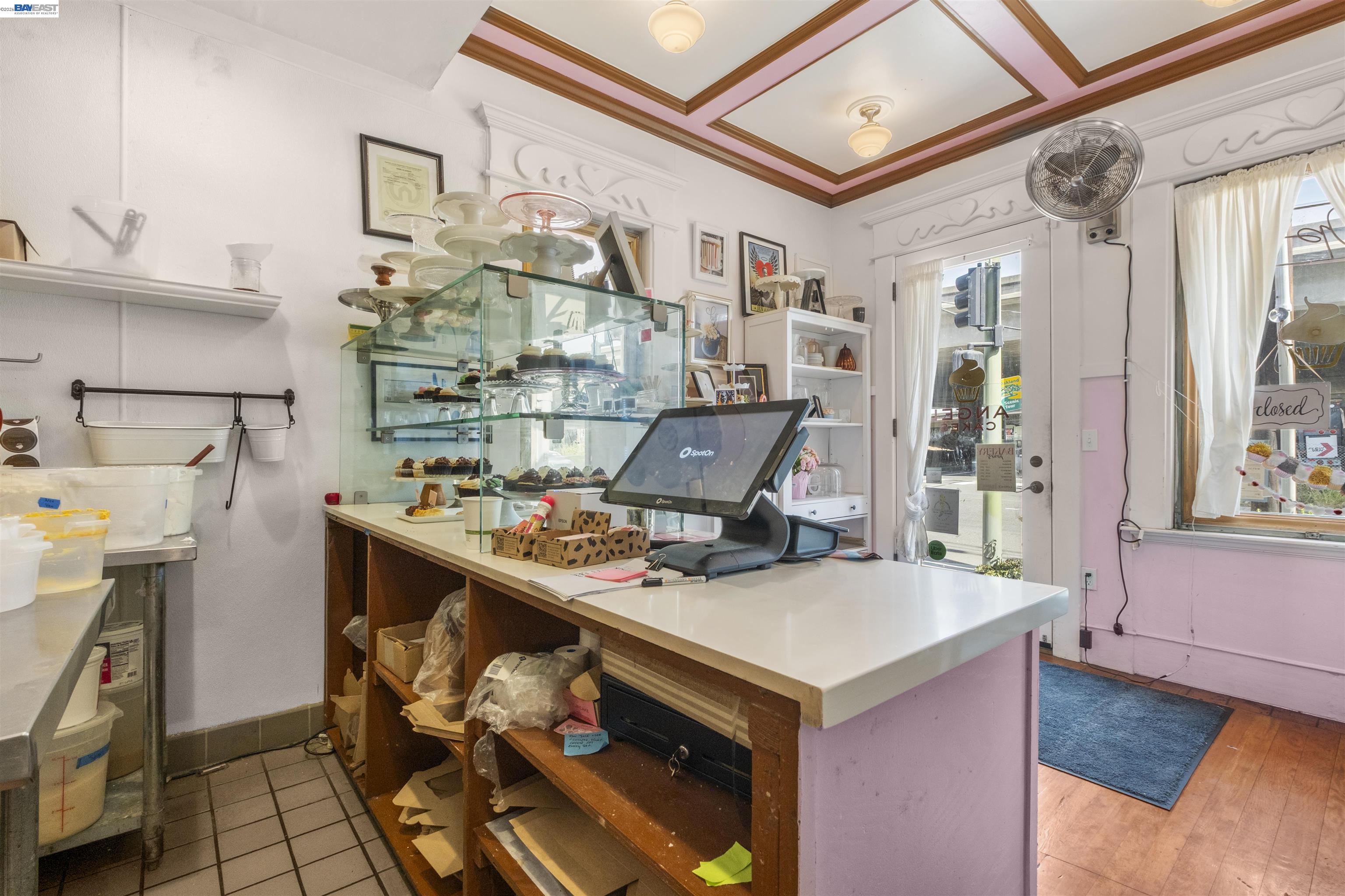 745 Fifth Street Oakland, CA 94607 - Photo 8 of 26 a view of a kitchen with fridge and workspace