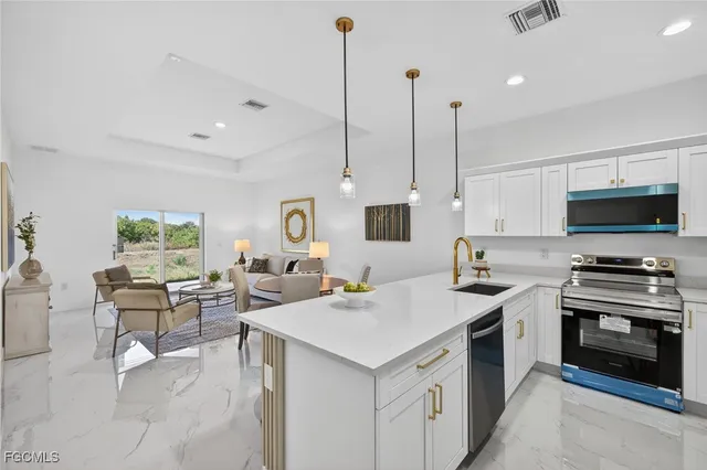 $323,000 | 512 Caywood Avenue South, Lehigh Acres, FL 33974