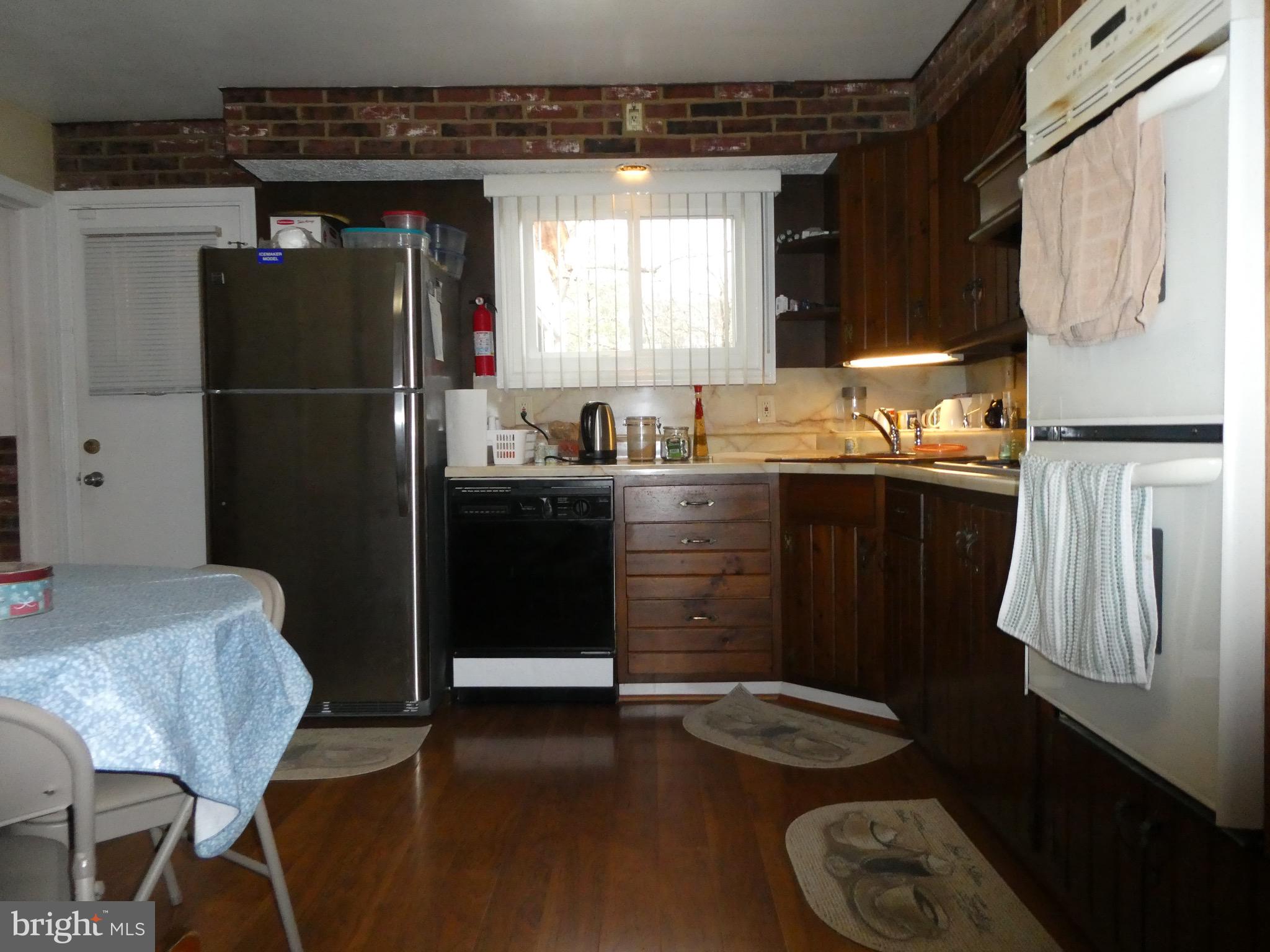 4024 Essex Road Baltimore, MD 21207 - Photo 11 of 44 Kitchen NOW has newer STAINLESS STEEL refrigerator