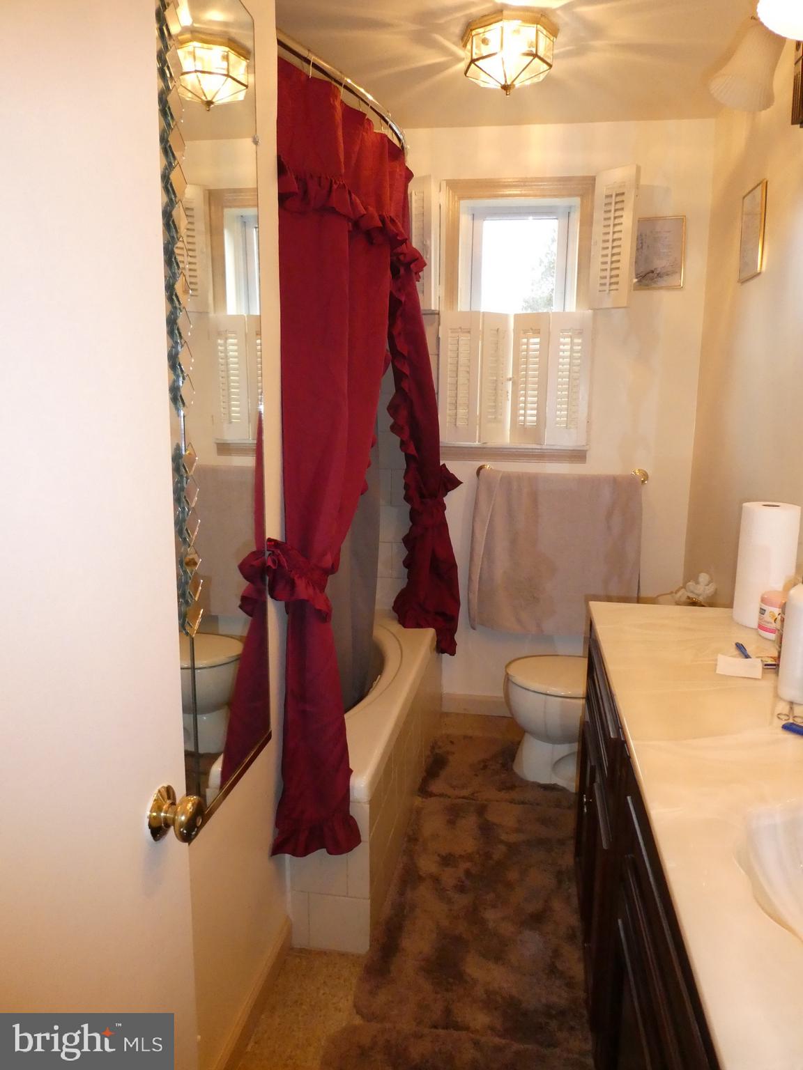 4024 Essex Road Baltimore, MD 21207 - Photo 16 of 44 Primary Full Bathroom with Whirlpool Tub & Shower
