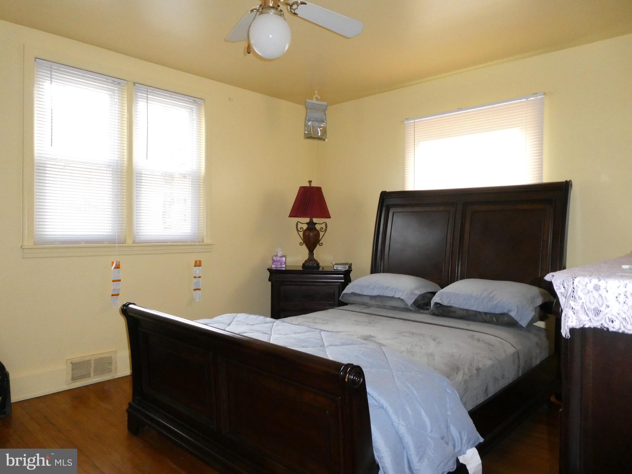 4024 Essex Road Baltimore, MD 21207 - Photo 17 of 44 2nd Bedroom w/ Ceiling Fan, H/W & 2 CEDAR CLOSETS
