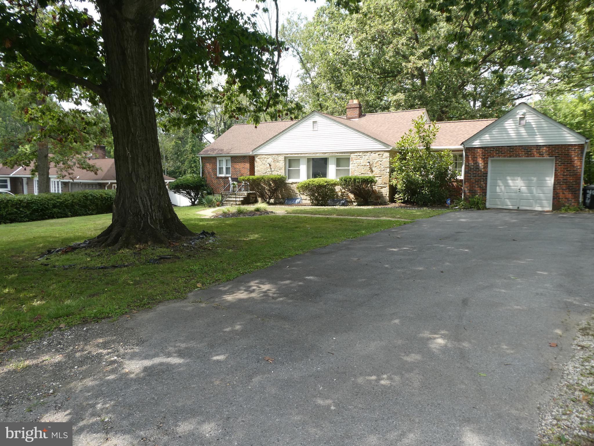 4024 Essex Road Baltimore, MD 21207 - Photo 3 of 44 Long, wide driveway accommodates 5+ cars/trucks