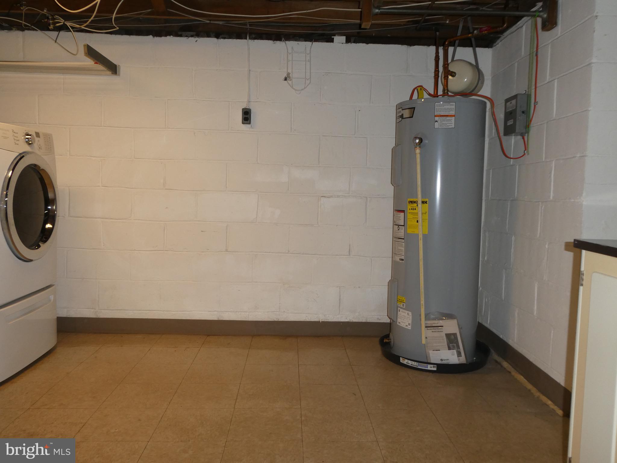 4024 Essex Road Baltimore, MD 21207 - Photo 23 of 44 50 gallon water tank (3+ years old)