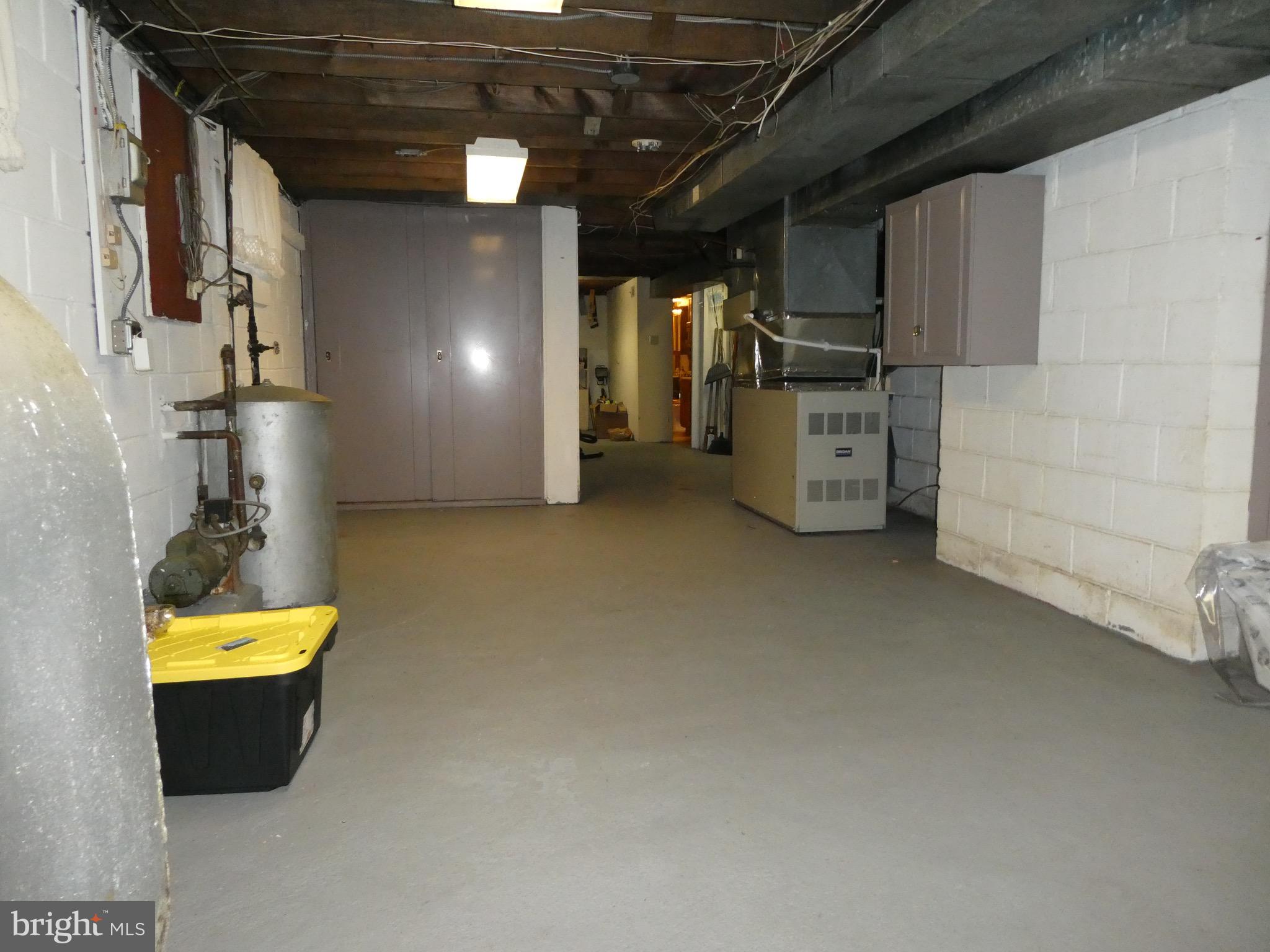4024 Essex Road Baltimore, MD 21207 - Photo 26 of 44 Spacious Storage Area runs length of house