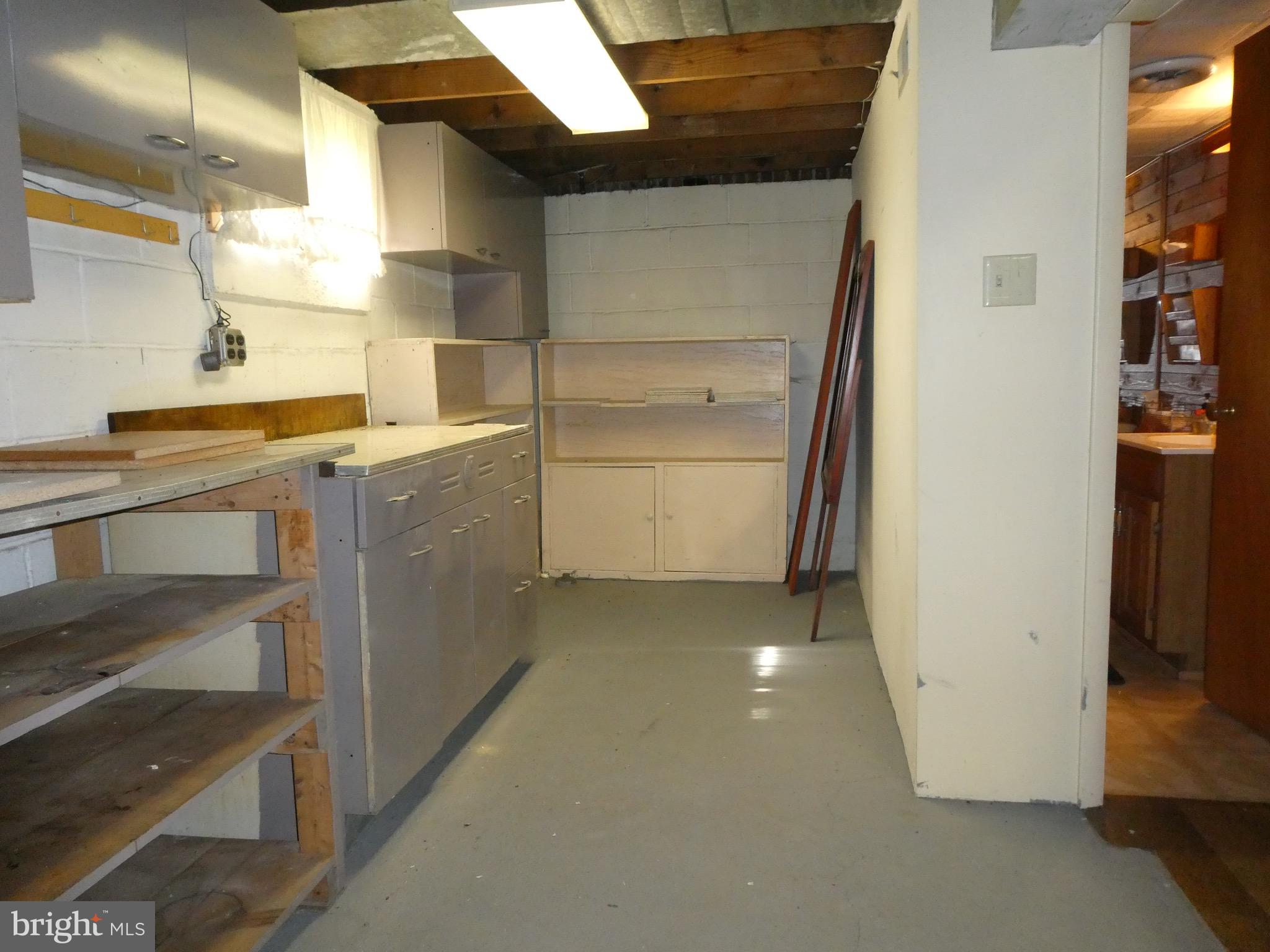 4024 Essex Road Baltimore, MD 21207 - Photo 31 of 44 ... or Hobby bench shelves/cabinets by Half Bath