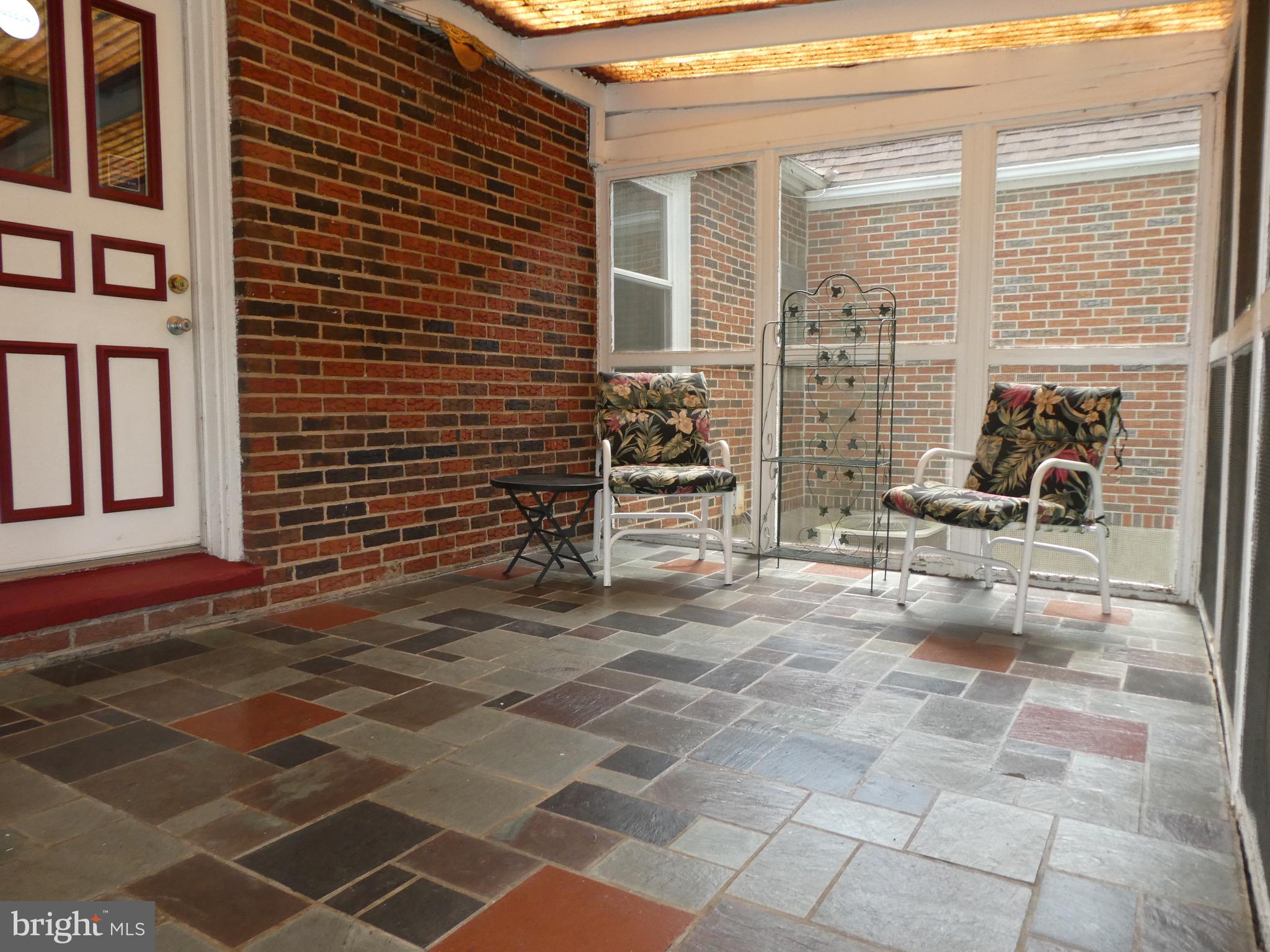 4024 Essex Road Baltimore, MD 21207 - Photo 37 of 44 Screened Porch off Kitchen