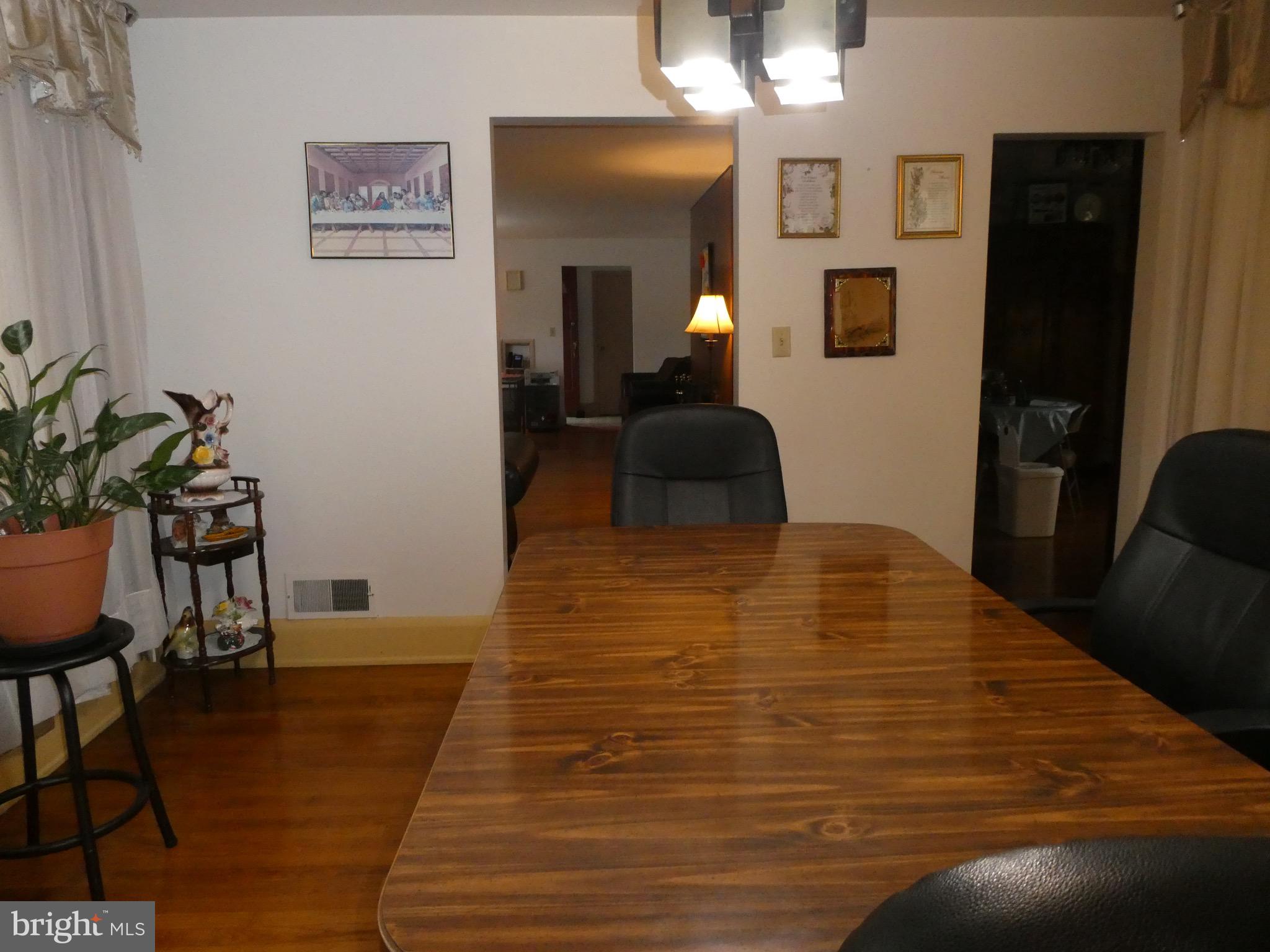 4024 Essex Road Baltimore, MD 21207 - Photo 8 of 44 Dining Room view to (now carpeted) Living Room