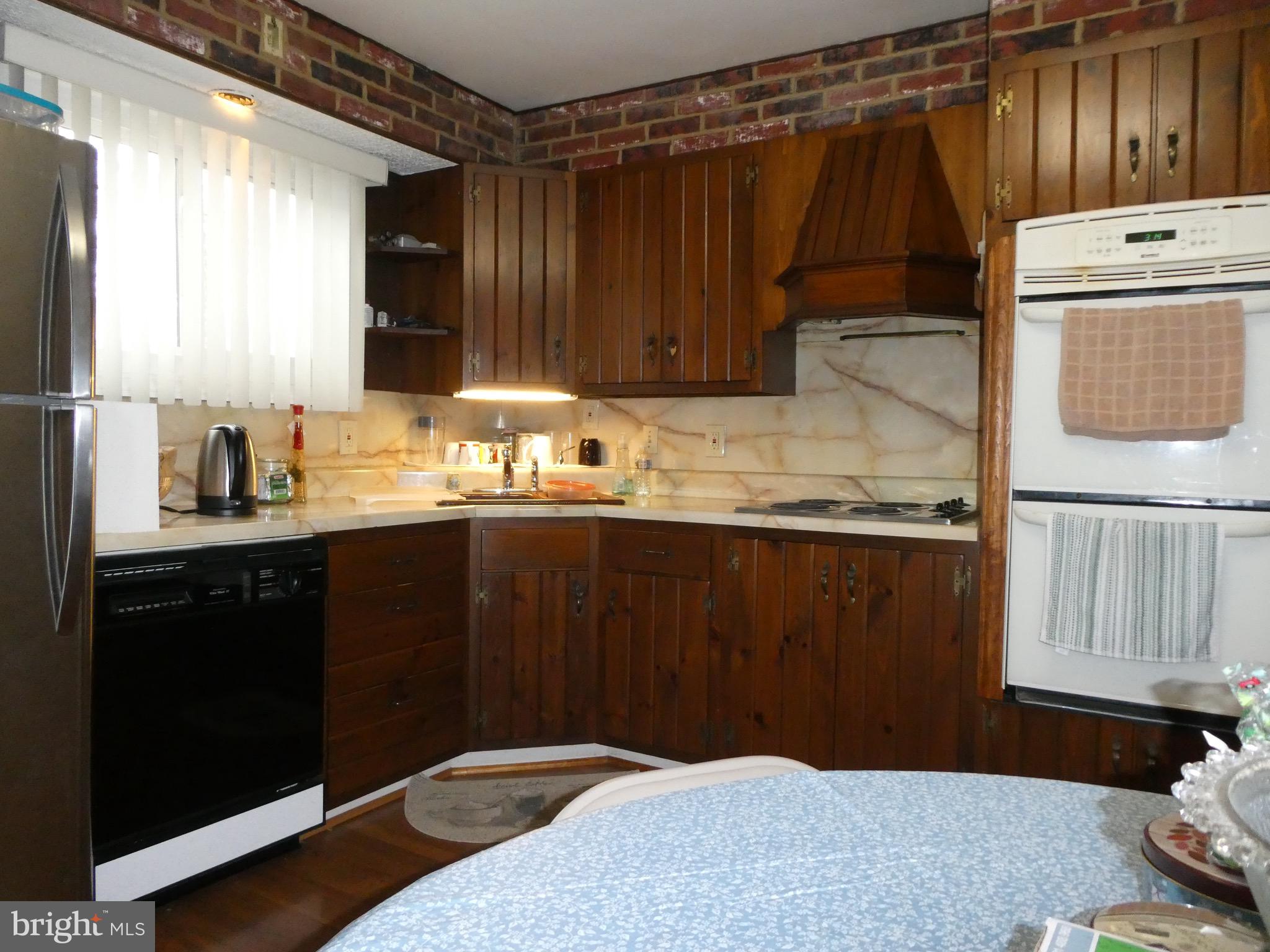 4024 Essex Road Baltimore, MD 21207 - Photo 9 of 44 Double-wall ovens, custom wood pantry and more!