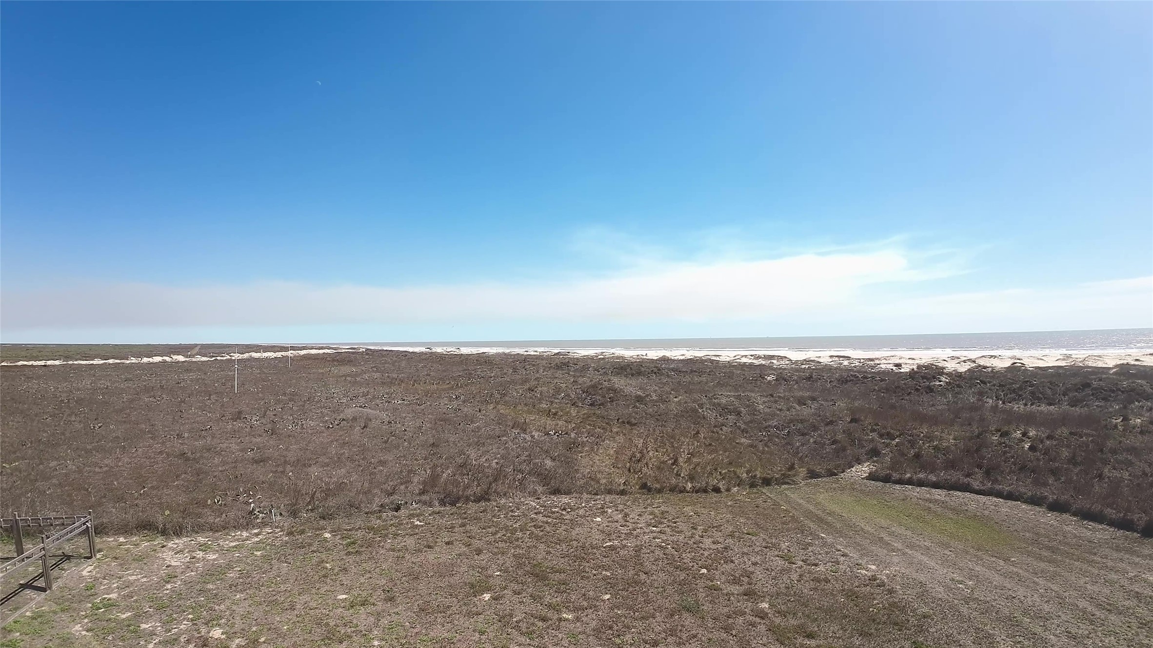 279 Private Road 640 Road Matagorda, TX 77457 - Photo 3 of 6 a view of a dry yard with trees in back