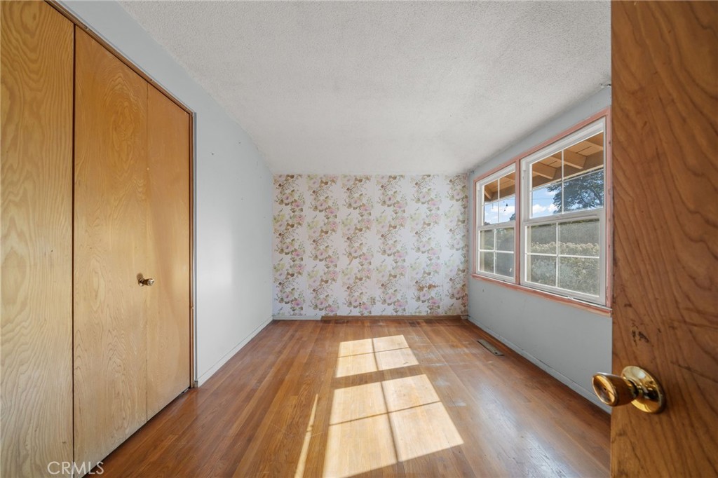 27151 Pembina Road Rancho Palos Verdes, CA 90275 - Photo 15 of 33 a view of empty room with wooden floor and fan