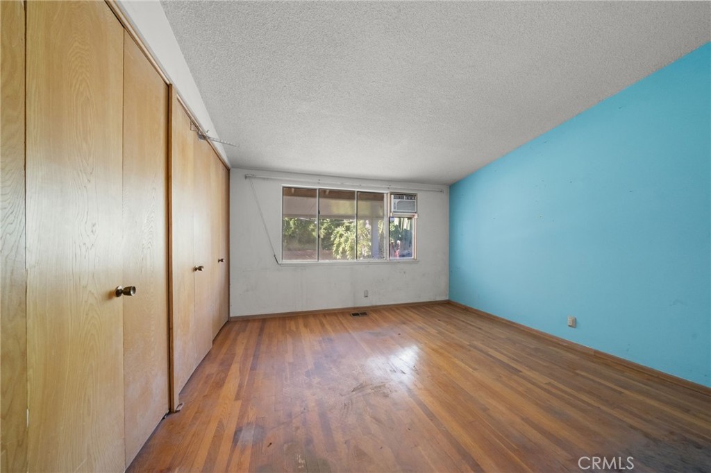 27151 Pembina Road Rancho Palos Verdes, CA 90275 - Photo 17 of 33 wooden floor in an empty room with a window