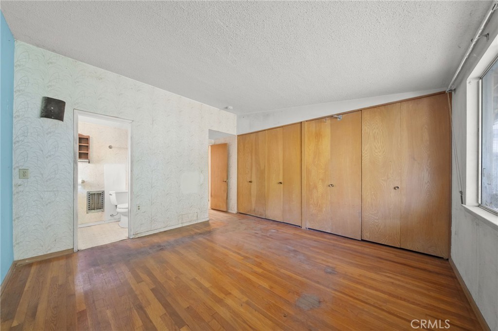 27151 Pembina Road Rancho Palos Verdes, CA 90275 - Photo 19 of 33 a view of an empty room with wooden floor and closet
