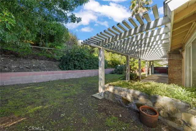 a view of a backyard with plants