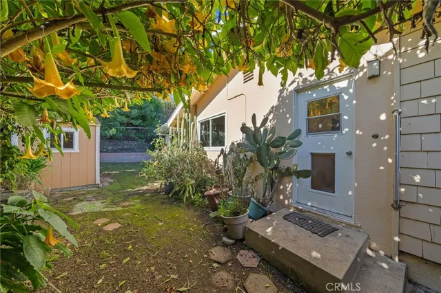 a backyard of a house with lots of green space