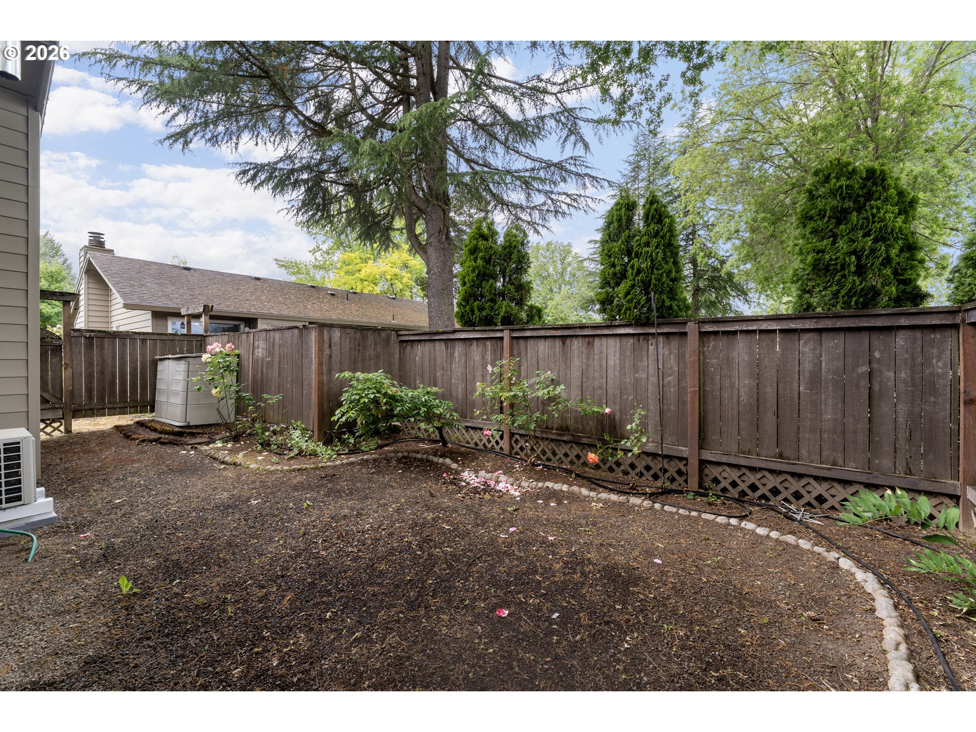 11341 Southwest Springwood Drive Portland, OR 97223 - Photo 25 of 26 a backyard of a house with lots of green space