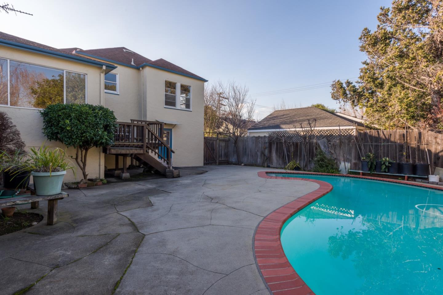 34 Dwight Road Burlingame, CA 94010 - Photo 13 of 13 a backyard of a house with yard and outdoor seating