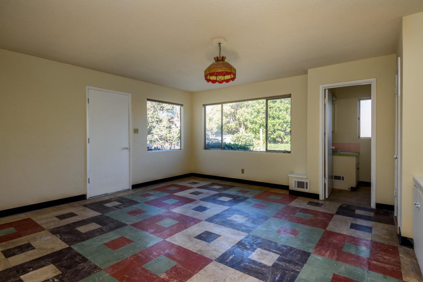 34 Dwight Road Burlingame, CA 94010 - Photo 6 of 13 a view of an empty room and window