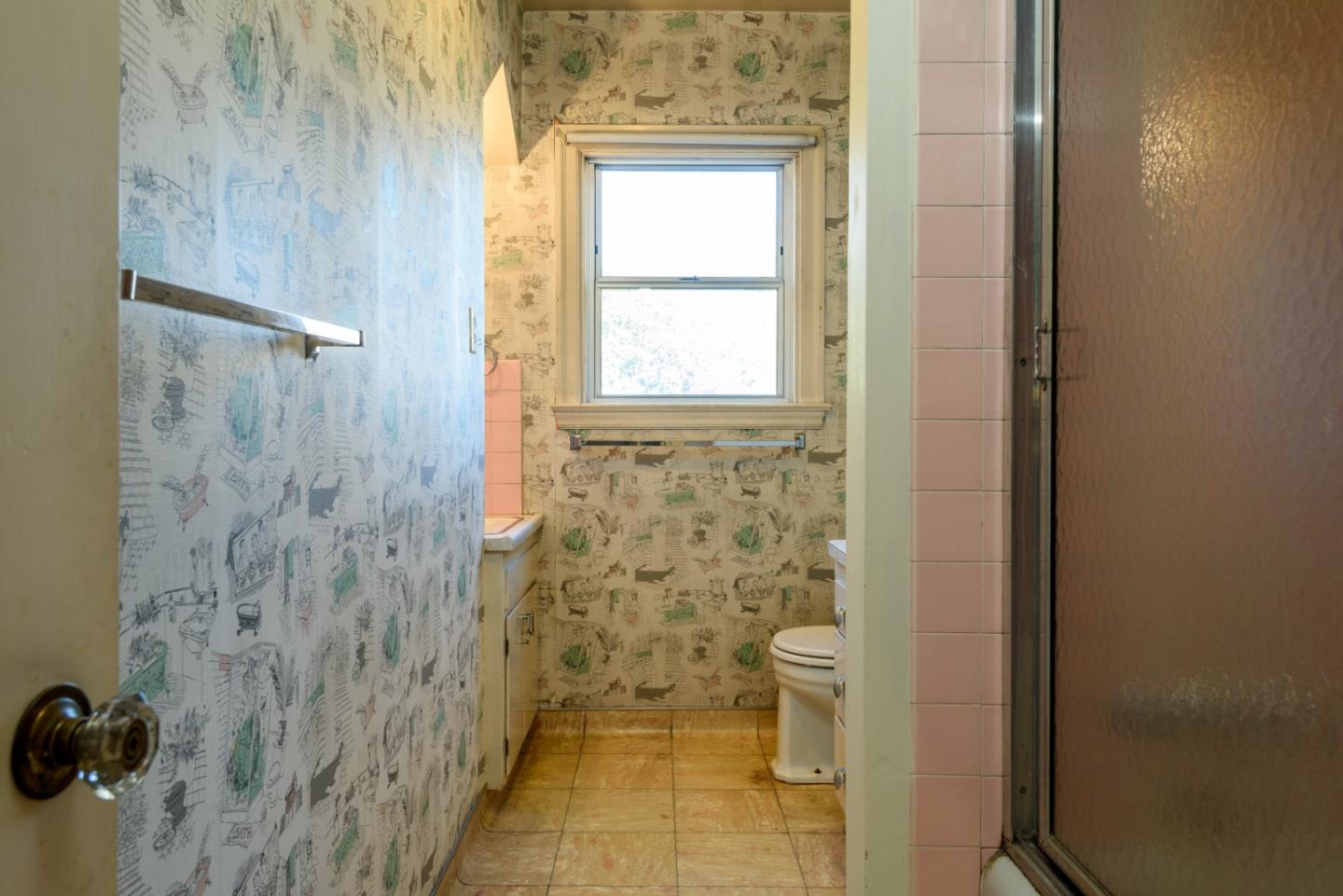 34 Dwight Road Burlingame, CA 94010 - Photo 10 of 13 a bathroom with a granite countertop shower a toilet and a window