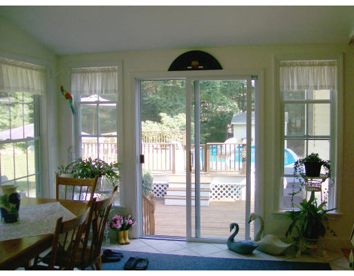 23 Deborah Road Hanover, MA 02339 - Photo 15 of 28 a view of a porch with seating space