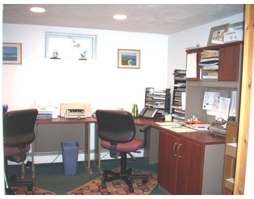 23 Deborah Road Hanover, MA 02339 - Photo 20 of 28 a room with furniture a rug and a painting on the wall