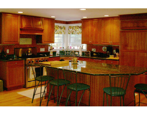 23 Deborah Road Hanover, MA 02339 - Photo 3 of 28 a kitchen with a sink and cabinets