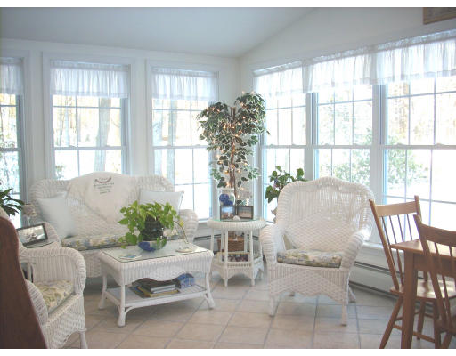 23 Deborah Road Hanover, MA 02339 - Photo 4 of 28 a living room with furniture and a large window