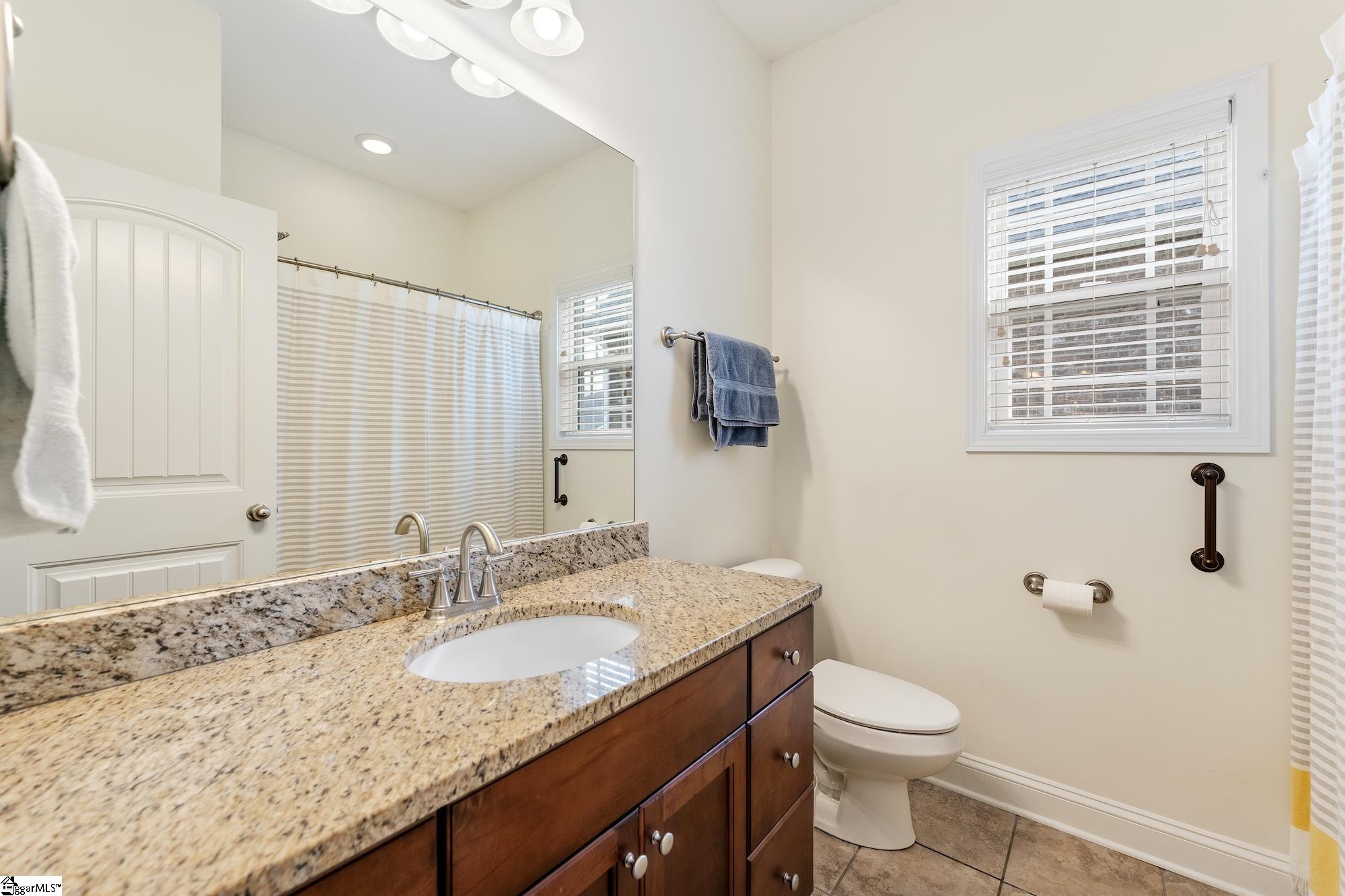137 Prescott Drive Anderson, SC 29621 - Photo 25 of 31 Granite counters, tile flooring, tub/shower combo