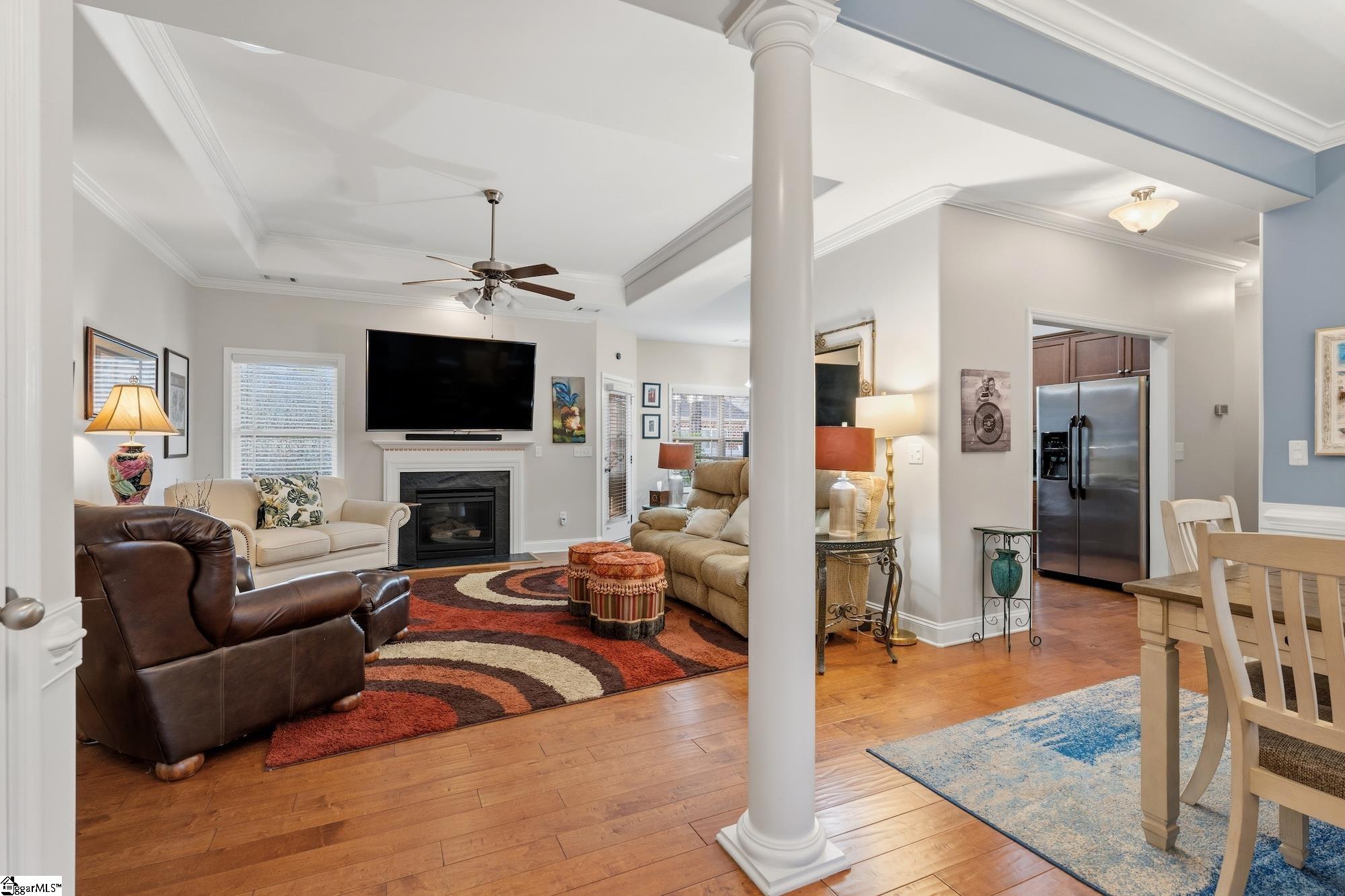 137 Prescott Drive Anderson, SC 29621 - Photo 5 of 31 Great room has hardwood flooring, two sun tubes, trey ceiling and gas fireplace.