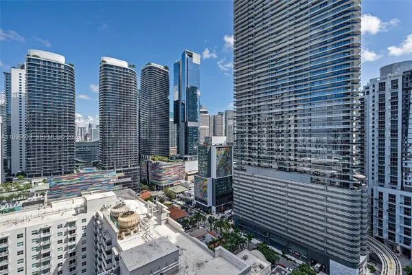 a view of city with tall buildings