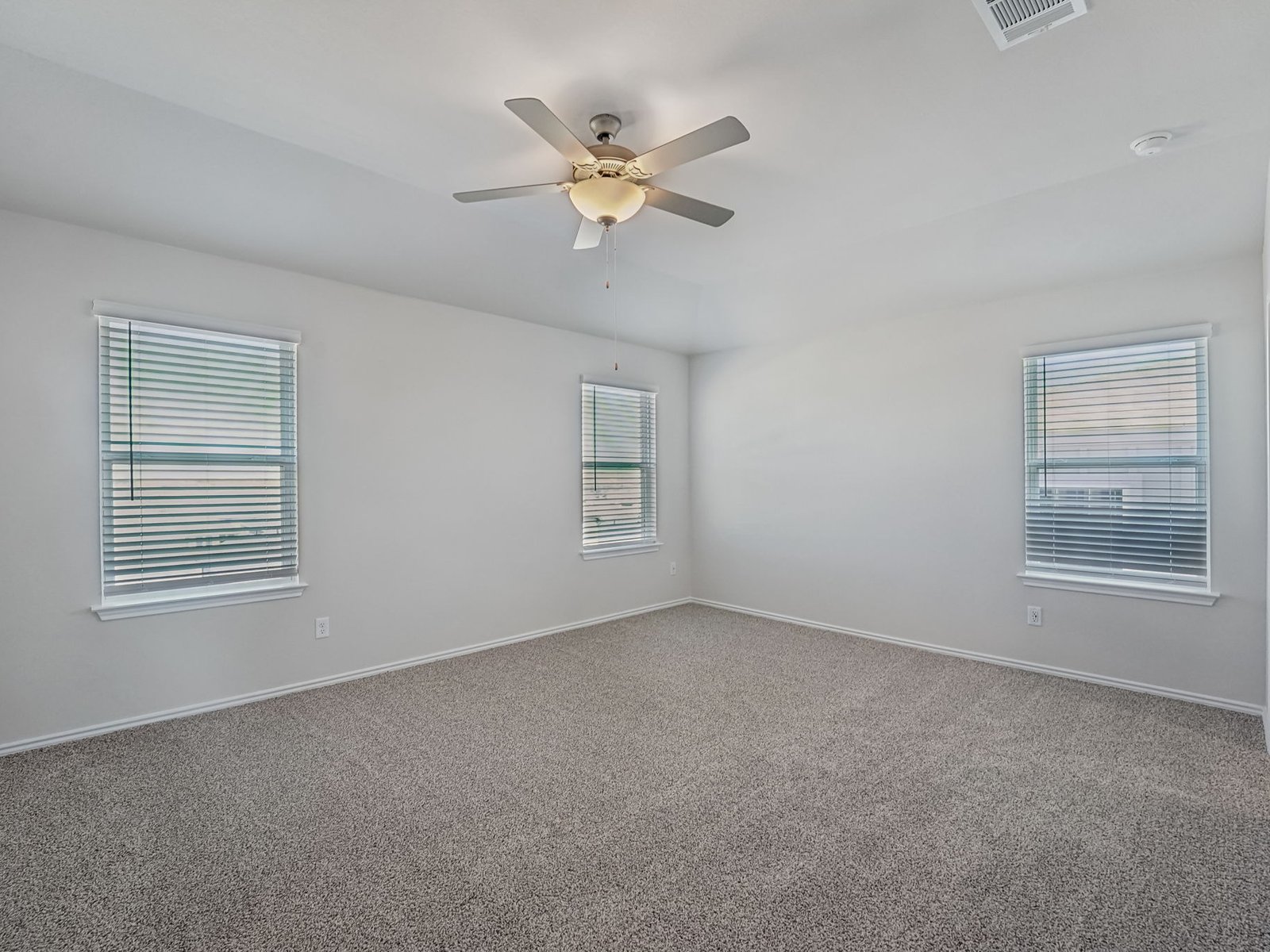 165 Calcite Road, Unit 3 Kyle, TX 78640 - Photo 10 of 17 a view of an empty room with a window