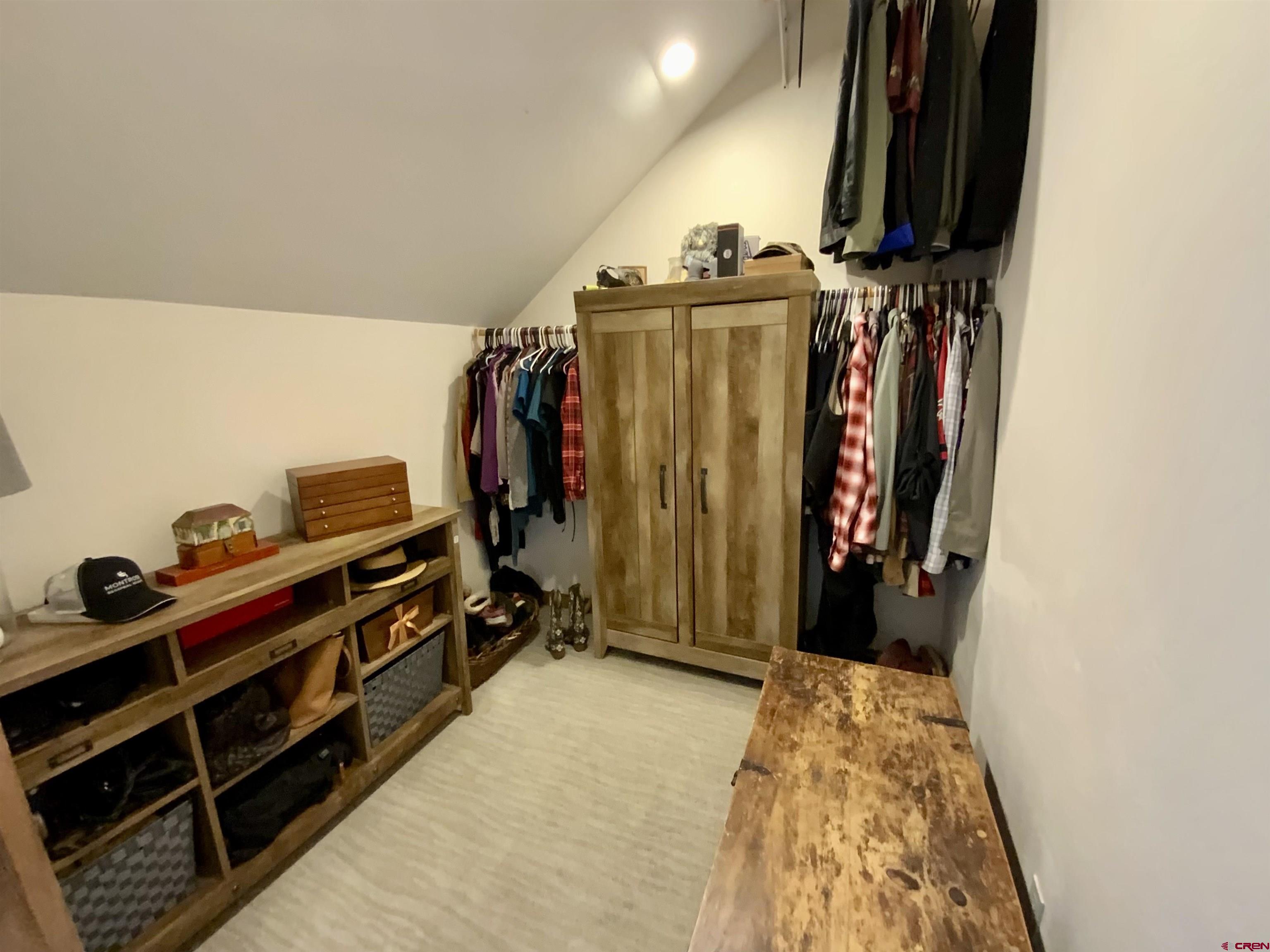 31876 State Highway Gunnison, CO 81230 - Photo 13 of 28 a view of walk in closet with clothes and shoes