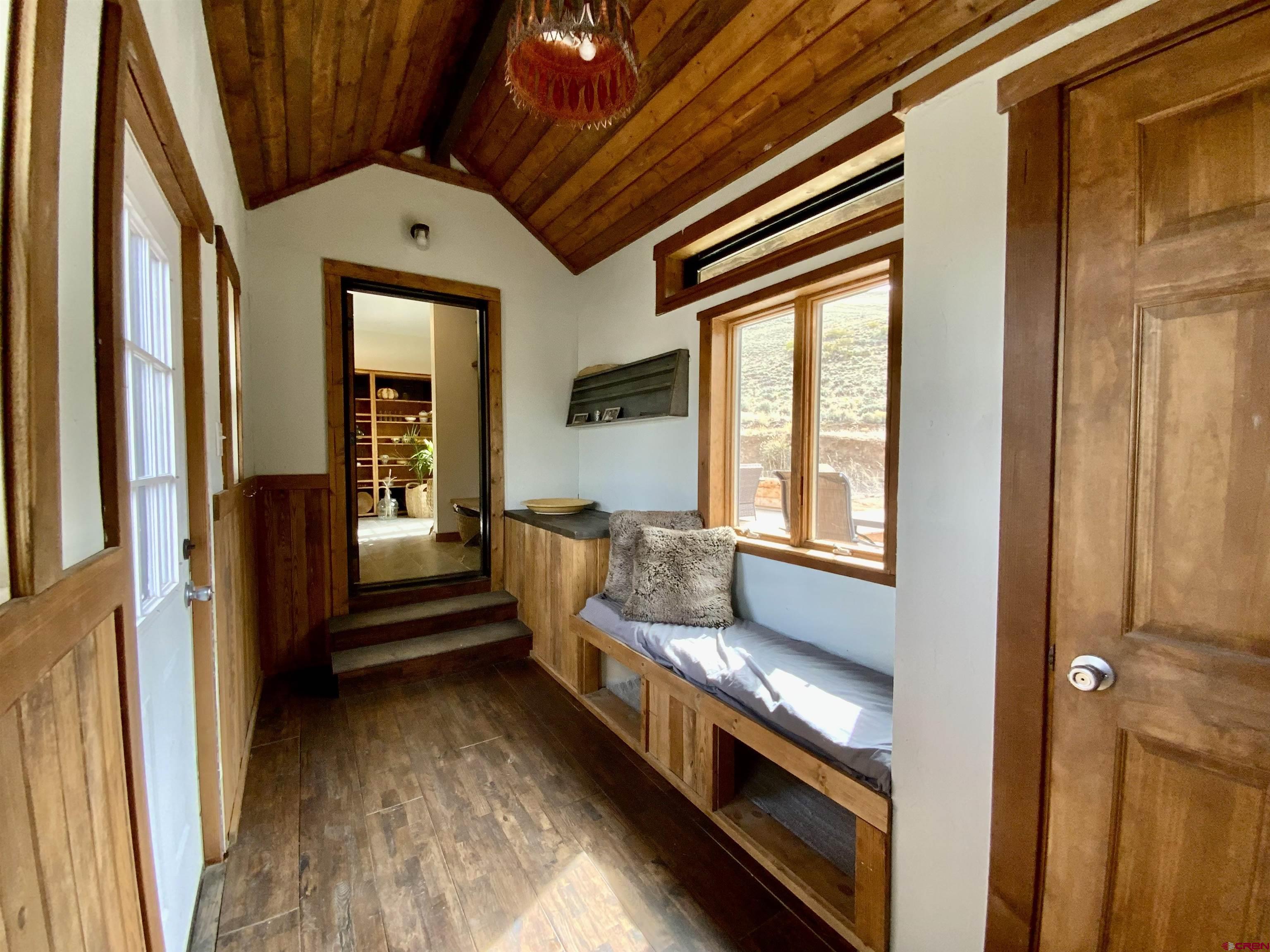 31876 State Highway Gunnison, CO 81230 - Photo 16 of 28 a view of entryway and hall with wooden floor