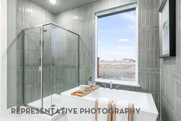 a bathroom with a tub and a window
