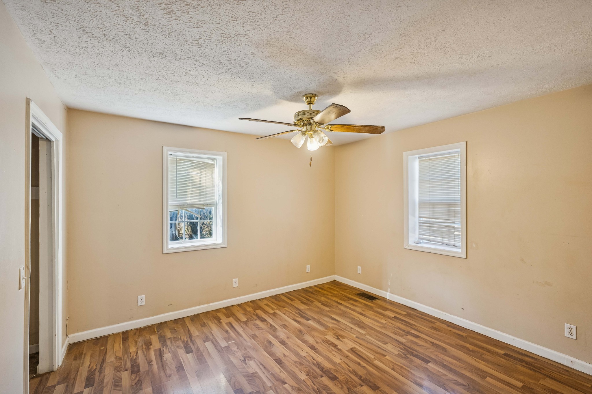 774 Enon Springs Road West Smyrna, TN 37167 - Photo 13 of 25 a view of an empty room with wooden floor and a window