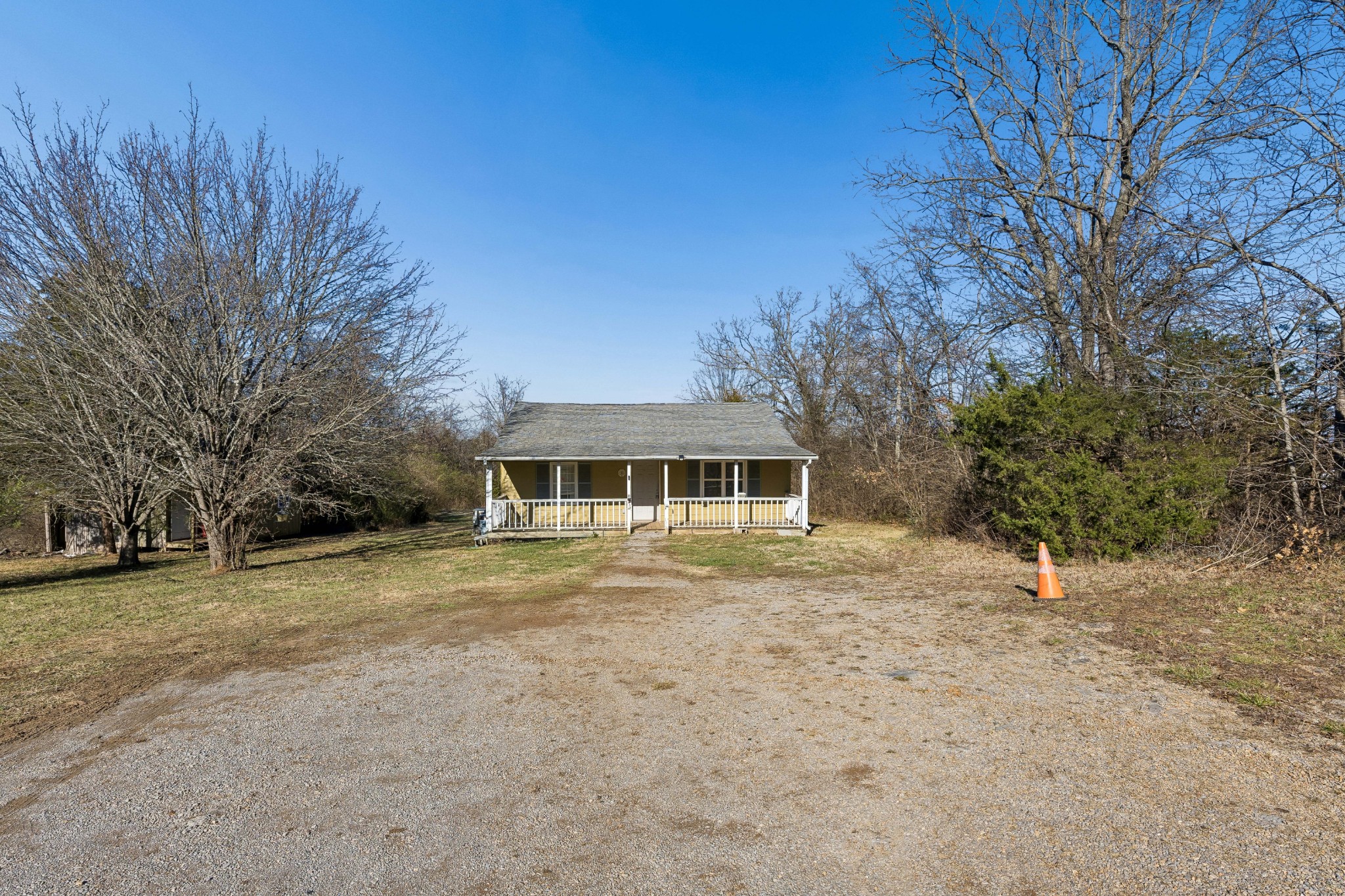 774 Enon Springs Road West Smyrna, TN 37167 - Photo 2 of 25 a front view of a house with a garden