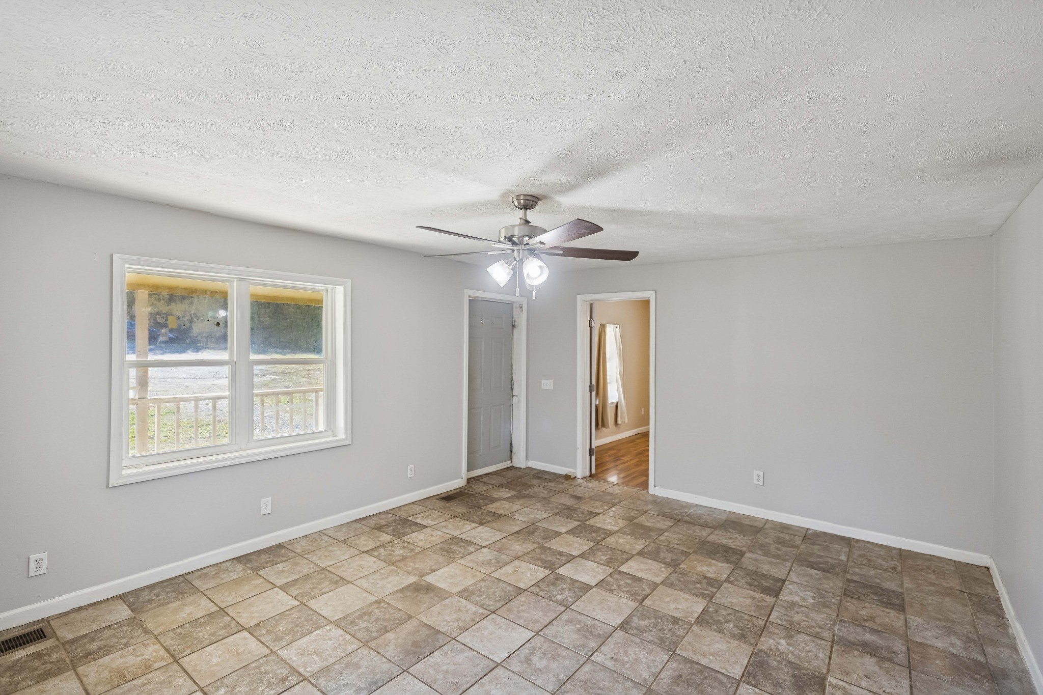 774 Enon Springs Road West Smyrna, TN 37167 - Photo 8 of 25 a view of an empty room with a window