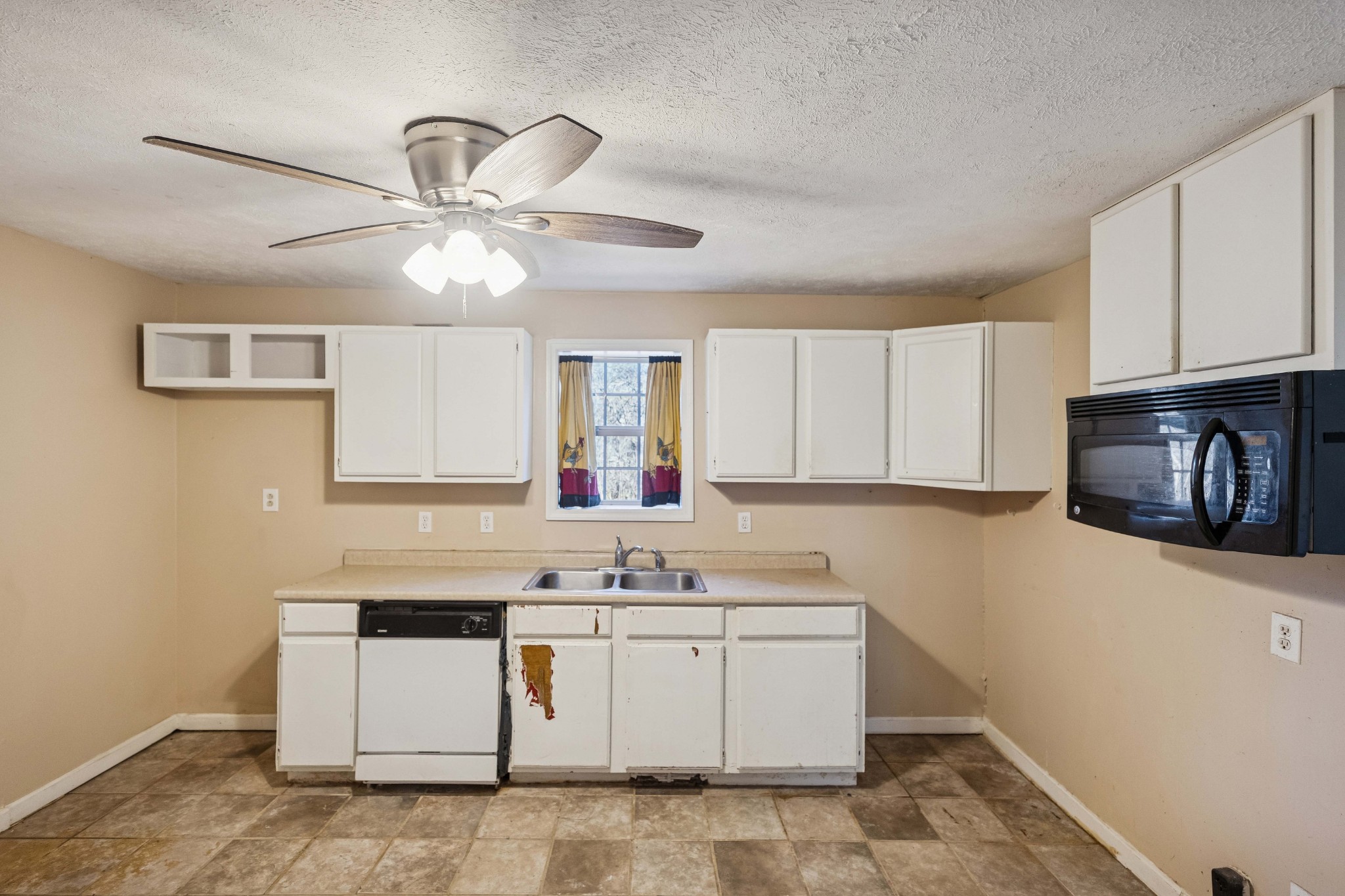774 Enon Springs Road West Smyrna, TN 37167 - Photo 10 of 25 a kitchen with a sink cabinets and window