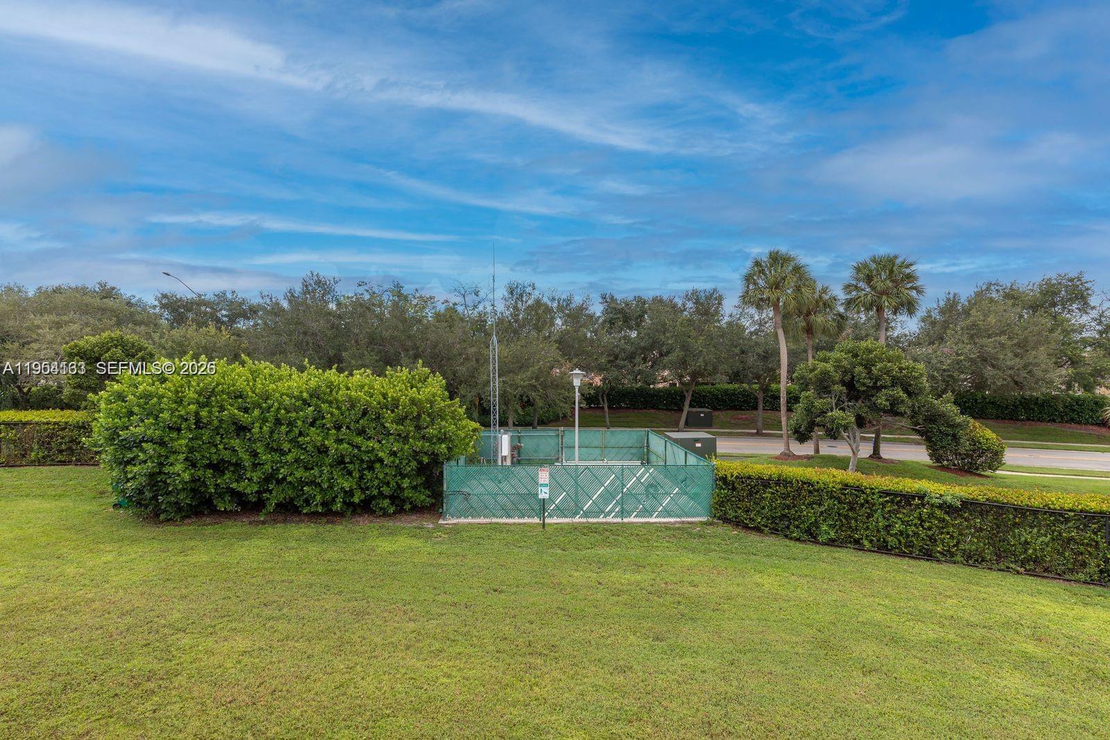 13216 Southwest 44th Street, Unit 11204 Miramar, FL 33027 - Photo 44 of 47 a view of a garden with an outdoor space