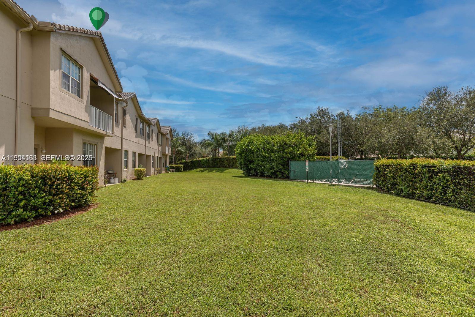 13216 Southwest 44th Street, Unit 11204 Miramar, FL 33027 - Photo 46 of 47 a view of an outdoor space and basketball court