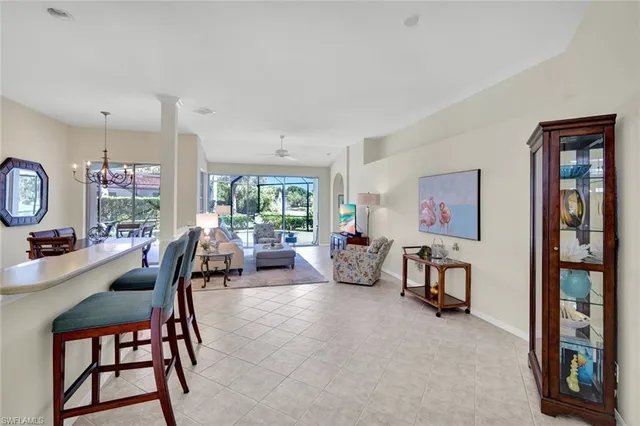 a view of a livingroom with furniture and a window