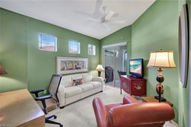 a bedroom with furniture and a wooden floor