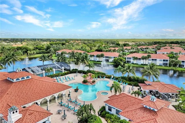 an aerial view of a houses with outdoor space