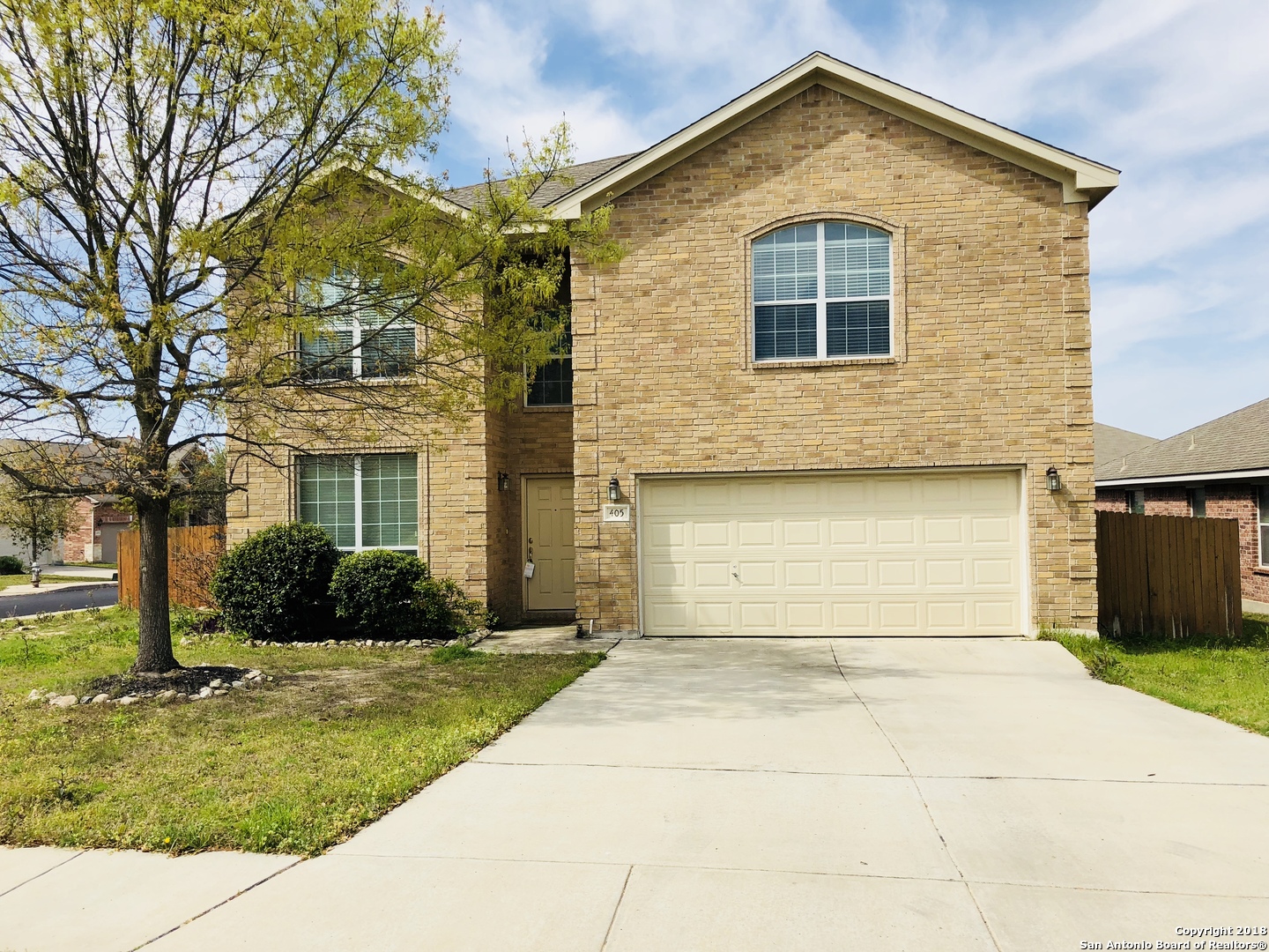 405 Point Valley San Antonio, TX 78253 - Photo 1 of 16 a front view of a house with garden